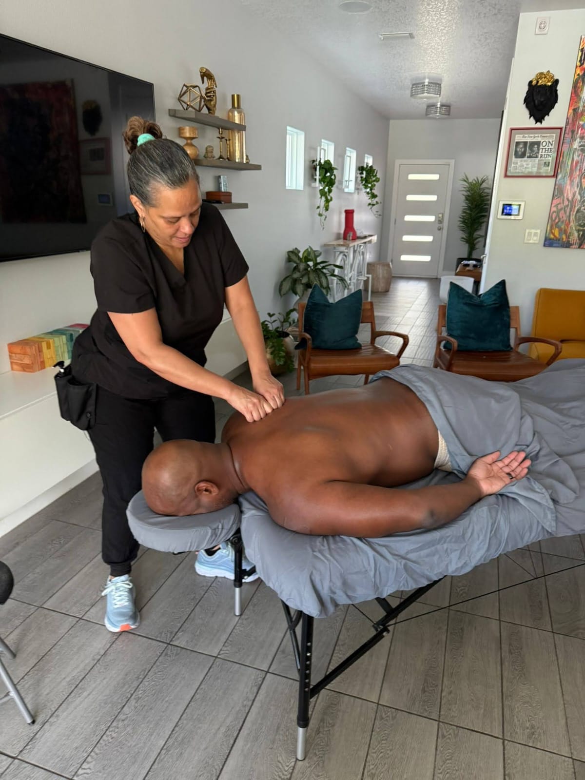 Jennel performing a therapeutic massage